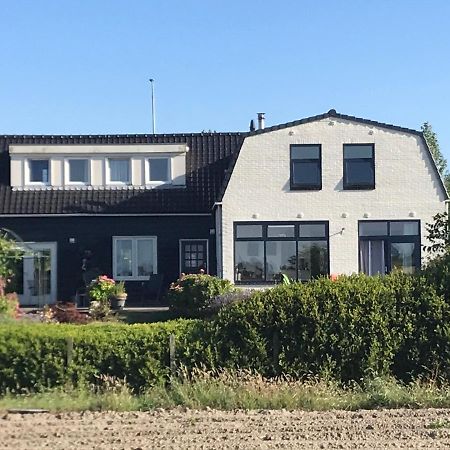 T Huuske Tuinappartement Met Fantastisch Uitzicht, Nabij Zee Zonnemaire Eksteriør billede