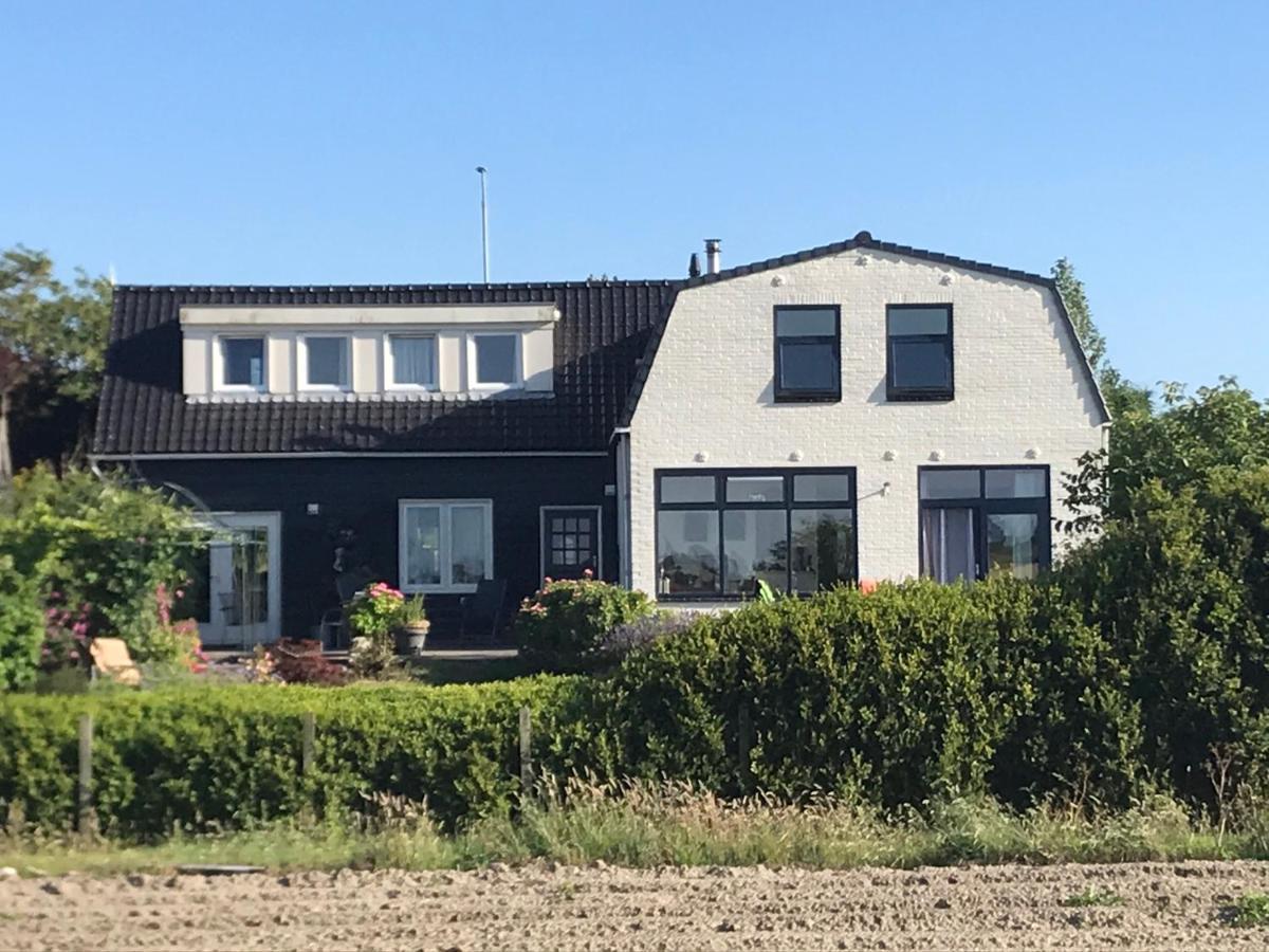T Huuske Tuinappartement Met Fantastisch Uitzicht, Nabij Zee Zonnemaire Eksteriør billede