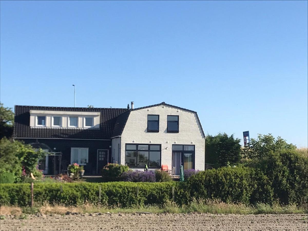 T Huuske Tuinappartement Met Fantastisch Uitzicht, Nabij Zee Zonnemaire Eksteriør billede